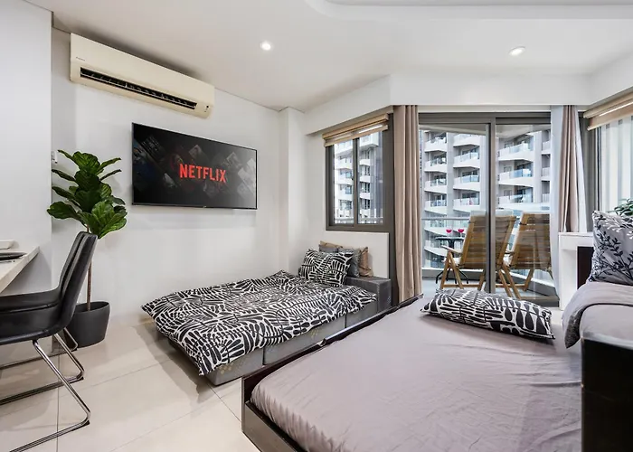 Studio For 5 At Tambuli Residences Garden View By Dominik Studio Apartment With Pool Access & Balcony In Mactan