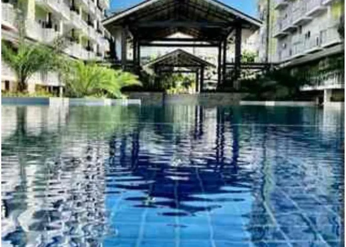 212B Amani Grand Resort Residences Near Mactan Airport With Pool, Gym, Wifi, Netflix